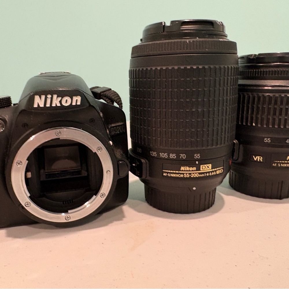 Nikon Black DSLR Camera with Dual Lenses